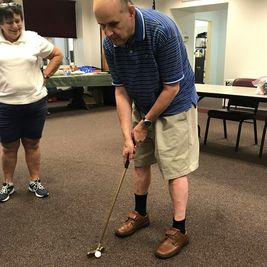 Picture of Joe during the Explore with me program golfing